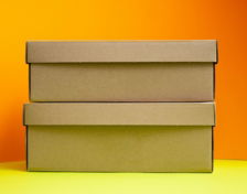 three cardboard boxes stacked on top of each other